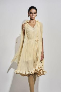 Carnation Drop Waist V-Neck Chiffon Midi Dress | MEAN BLVD Summer Pleated V-neck Chiffon Dress, Silk V-neck Summer Cocktail Dress, Chic V-neck Chiffon Cocktail Dress, Elegant Spring V-neck Chiffon Dress, Pleated V-neck Chiffon Dress For Summer, Chic Chiffon V-neck Midi Dress, Elegant Sheer Chiffon Summer Dress, Sheer Summer Dress With Asymmetrical Neckline, Summer Sheer Dress With Asymmetrical Neckline