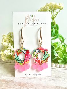 Dainty floral summer dangles!! Bright fun colors combo, they are fun to wear and easy to match to any outfit.  They are super Lightweight and comfortable. Printed acrylic pattern makes each pair look Unique and Beautiful. Since each pair captures different part of the same pattern, no 2 pairs are exactly the same. All will slightly vary in the exact pattern.  SIZING:  Earrings are approximately 1" wide (measuring at the widest part of the dangle)  & 1.38" long. Drop length including the ear wire hooks is approximately 2.36" MATERIALS:   Hooks are gold plated brass. Jumprings - gold plated brass. Earrings arrive beautifully packaged with lots of love and care. They'd make a great gift as well! If you have any questions, please do not hesitate to contact me. Playful Summer Drop Earrings, Dangle Earrings For Spring Vacation, Spring Vacation Dangle Earrings, Multicolor Summer Earrings, Adjustable Whimsical Earrings For Summer, Playful Pink Earrings For Summer, Playful Pink Earrings For Beach, Summer Dangle Flower Earrings Gift, Colorful Earrings As Spring Gift