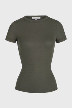 Fitted tee with a crew neckline. Feel a subtle pop of texture in this tight-knit ribbed fabric. It's stretchy, comfortable and forms perfectly to your body. Color: Mineral Rib Sizing: X/S (0-2), S/M (4-6), M/L (8-10) Model is 5'8" and is wearing size X/S Fabric: 95% Ribbed Rayon, 5% Spandex Care: Machine Wash Cold With Like Colors.Care: Lay Flat to Dry. JOAH BROWN | MADE IN LOS ANGELES Form Fitting Tops, Joah Brown, Black Friday Promotions, Fitted Tee, Ribbed Fabric, Green Cotton, Workout Tee, Size Clothing, Angeles