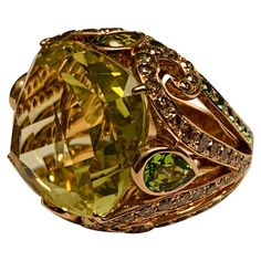 Luxury Multi-stone Yellow Gemstones, Luxury Yellow Multi-stone Gemstones, Luxury Yellow Gold Peridot Jewelry, Luxury Peridot Rings With Accent Stones, Luxury Citrine Gemstones With Accents, Formal Green Citrine Jewelry, Luxury Multi-stone Peridot Ring, Luxury Peridot Multi-stone Rings, Luxury Peridot Jewelry For Gifts