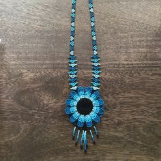 Amazing Brand New From Mexico Blue Adjustable Long Necklace, Bohemian Blue Flower Necklace, Handmade Adjustable Blue Turquoise Necklace, Blue Beaded Flower Jewelry, Blue Bohemian Flower Beaded Necklaces, Blue Flower-shaped Beaded Jewelry, Bohemian Light Blue Flower Jewelry, Handmade Blue Flower Beaded Necklaces, Handmade Blue Flower Beaded Necklace