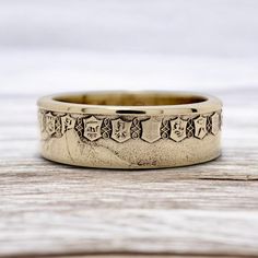 Experience the timeless elegance and rich cultural legacy of Italy with our exclusive Coin Ring Italy. Handcrafted from authentic Italian coins, each ring is a unique piece of jewelry that captures the essence of this iconic Mediterranean nation. These rings are more than just accessories; they are a tribute to Italy's profound history, artistic achievements, and passion for beauty and craftsmanship. Our skilled artisans carefully preserve the intricate details of each coin, showcasing symbols that resonate with Italian identity--such as the laurel wreaths of ancient Rome, representing victory and honor, or the iconic imagery of the Italian Republic. Wearing the Coin Ring Italy connects you to the heart of Italian culture, evoking the grandeur of Rome's ancient ruins, the beauty of the Tus Symbolic Ceremonial Jewelry With Engraving Option, Antique Engraved Open Ring For Ceremonial Occasions, Etched Promise Ring Jewelry, Heirloom Rings With Decorative Round Band, Heirloom Engraved Ring Jewelry, Symbolic Engraved Rings For Ceremonial Occasion, Symbolic Ceremonial Engraved Rings, Symbolic Ceremonial Ring, Vintage Ceremonial Jewelry Metal Ring