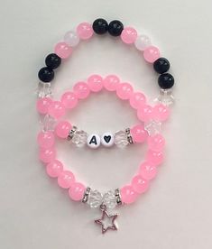 made with lots of love and quality materials for memories that will last a life time 🤍 🎀bracelet size is the same for all the bracelets but if you have any concerns or requests about it then don't hesitate to contact me! 🎀i ship my orders almost immediately 🎀beaded bracelets perfect for couples, best friends, siblings, sisters, mother and daughter, and even just for yourself! can be a great birthday gift, anniversary gift, mother's day gift, wedding gift, wedding shower gift, baby shower gif Personalized Pink Charm Bracelet For Birthday, Customized Pink Jewelry For Friendship, Customizable Pink Charm Bracelet For Birthday, Custom Name Pink Charm Bracelet For Mother's Day, Customizable Pink Bracelet Jewelry, Customized Trendy Pink Charm Bracelet, Customizable Pink Charm Bracelet As Gift, Pink Beaded Name Bracelet For Birthday, Pink Charm Bracelet With Round Beads For Friendship