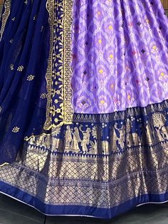 The upcoming wedding season calls for a truly mesmerizing outfit, and our fascinating lavender digital printed dola silk wedding lehenga choli is here to make a statement. Crafted with utmost care and attention to detail, this stunning lavender lehenga choli is the perfect pick for your festivals, weddings, occasions, and other events.
Featuring a lavender color dola silk material lehenga, this piece boasts a digitally printed design that adds a touch of elegance and uniqueness. The contrast foi Lavender Lehenga, Wedding Lehenga Choli, Wedding Lehenga, Silk Wedding, Silk Material, Lavender Color, Navy Blue Color, Half Saree, Cut Work