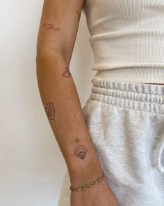 a woman with a tattoo on her arm