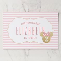 a pink and gold minnie mouse birthday card with the number two on it's front