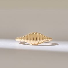 The 14k Solid Gold Line Signet Ring is a sleek and minimalistic jewelry piece designed for women. This slim pinky ring serves as an everyday statement ring, ideal for those who appreciate subtle yet elegant jewelry. Features * Made to Order. * Gold KT: 10K, 14K, 18K * Custom Gold Color: Rose Gold, Yellow Gold, White Gold * Width of Band: 1.53MM * Top of Band: 7.20MM * Thickness of Band: 1.23MM * Ready to Ship in 5-7 Business Days ✓ We care about the environment,the jewelry we cast is made with recycled gold. We source exclusively post-consumer material that is refined back to their pure elements to ensure that the gold is in the same quality. Our designs are made from 14k/18k/10k real solid gold ✓ We care about customer satisfaction and long-term relationship so our designs are made by con Minimalist 14k Gold Dome Ring Tarnish Resistant, Modern 14k Gold Dome Ring For Everyday, Minimalist Yellow Gold Stackable Dome Ring, Minimalist Yellow Gold Dome Ring, Minimalist Tarnish Resistant Dome Ring For Anniversary, Tarnish Resistant Minimalist Dome Ring For Anniversary, Minimalist 14k Gold Stackable Dome Ring, Minimalist 14k Gold Dome Ring, Minimalist Yellow Gold Dome Promise Ring