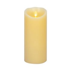 a lit candle on a white background