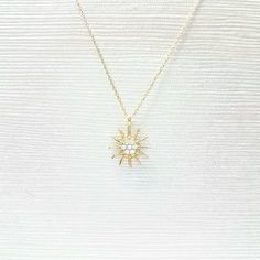 -The sun shaped pendant is made with high-quality 14K solid gold. Also we have listed bracelet and earrings with the same models. So you can combined them. https://www.etsy.com/shop/LatikaJewelryShop - High polish finish and set with flawless cubic zirconia stones. - This dainty, delicate and trendy pendant necklace has been artfully designed for timeless yet modern millennial fashion and you can order in three different colors, yellow , white and rose. - This 14K solid gold pendant comes with a Gold Jewelry With Sparkling Stones For Gift, Gold Jewelry With Sparkling Stones, Dazzling Yellow Gold Jewelry With Sparkling Stones, Celestial Cubic Zirconia Jewelry In Diamond White, Fine Jewelry In 14k Gold With Sparkling Stones, 14k Gold Jewelry With Sparkling Stones, White Snowflake Jewelry For Anniversary, Dainty Sparkling Stones Jewelry For Gifts, Dazzling Diamond Cut Jewelry Gift