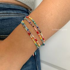 Bright colorful seed bead boho bracelet for women, Dainty multicolored stacking bracelet, handmade beach gift for her ◽️ S I Z E ∙ G U I D E ◽️   All bracelets in shop are adjustable, which can fit for most wrist size. ◽️ P A C K A G I N G ∙ R E C E I P T S ◽️  * All items are nicely packaged ready to gift in elegant jewelry boxes. * As so many of our orders are gifts, I do not include receipts in any of our packaging. Receipts can be found under your purchases on Etsy. ◽️ U P G R A D E ∙ P A C K A G I N G ◽️  * Our default packaging is gift-ready. You can also upgrade it to premium gift wrapping by clicking 「 Mark order as a gift 」 when check out. ◽️ T U R N ∙ A R O U N D ∙ T I M E ◽️   * All items purchased will be shipped within 5 business days. ◽️ D O M E S T I C ∙ S H I P P I N G ∙ T Bracelet Stack Boho, Multicolor Friendship Bracelets With Spacer Beads As Gift, Multicolor Round Bead Friendship Bracelets For Everyday, Multicolor Friendship Bracelets With Round Beads For Everyday, Multicolor Heishi Beads Friendship Bracelet Gift, Multicolor Beaded Friendship Wrap Bracelet, Multicolor Beaded Wrap Bracelet As Gift, Everyday Multicolor Friendship Bracelets With Round Beads, Everyday Multicolor Beaded Wrap Bracelet