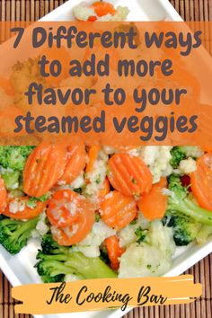 a white plate topped with broccoli and carrots on top of a table