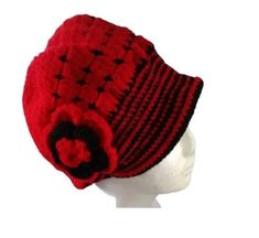 Handmade Worsted Cap Red Color with Black Flower. These caps are handmade, made of yarn, and have unique, soft, and warm designs. In a smoke and pet-free environment. PLEASE NOTE THAT THE COLOR MAY BE SLIGHTLY DIFFERENT FROM THE PHOTOS DUE TO LIGHTING EFFECTS Red Crochet Hat One Size Fits Most, Red Acrylic Hat One Size Fits Most, Red Knitted Crochet Hat, Red Knitted Crochet Hat In Acrylic Yarn, Red Yarn Beanie One Size Fits Most, Red Yarn Crochet Hat, Red Brimmed Crochet Hat Made Of Yarn, Red Knitted Hat, Red Crochet Beanie From Yarn