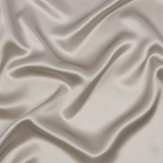 the white silk is very soft and smooth, but it doesn't look like any other fabric