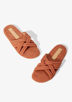 SIERRA is a part of our Vegan Collection!If you haven't heard, terracotta is the new neutral! Kick your shoe game up a notch with SIERRA woven rope slide sandals. They are 1000% vegan and handmade from plant-based fabric featuring an easy slide on design. Outsole is durable rubber for outdoor use and everyday wear. As always, sustainably and ethically handmade In India. Rope Sandals, Handmade Sandals, Slide On, On Design, Beach Sandals, Women Artisans, Handmade Shoes, Shoe Game, Slide Sandals