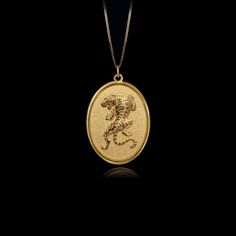 PENDANT INFORMATIONThis pendant is made of real, solid gold.• Made in USA• Material: 14k or 18k solid gold• Finish: polished• Height: 1.24" (31,5 cm) x Width: 0.87" (22 mm)• Pendant weight: approx. 6 grams (14k)• Bail: fits up to 4 mm chains• Solid back, not hollow• A certificate of authenticity is included• Delivered in our elegant jewelry box, making it the perfect gift Shipping: All of our orders are custom-made. Please allow approximately 3 weeks for production and shipping. Shipping include Gold Tiger, Creative Jewelry Photography, Tiger Pendant, Phoenix Pendant, Gold Dragon, Egyptian Jewelry, Small Circle, Solid Gold Chains, White Gold Chains