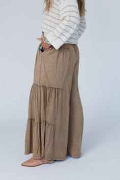 Take your boho style to the next level with these comfortable and chic pants, the Called A Dreamer Washed Wide Leg Pant! Perfect for any occasion, these pants will quickly become your go-to choice because they feature: So comfortable, mineral washed, Cotton fabric Loose and flowy silhouette Elastic, drawstring, high-rise waistband for added comfort and style Wide pant legs with so cute gathered details along the sides Side pockets for convenience So cute casual boho outfit pair with: Floral Text Casual Boho Outfits, Three Bird Nest, Padded Bralette, Boho Outfit, Chic Pants, Wide Leg Pant, Wide Pants, Boho Casual, Next Level