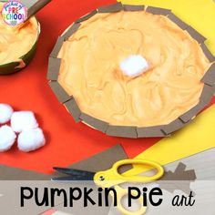 pumpkin pie art project for kids to make with paper and cotton balls on the table