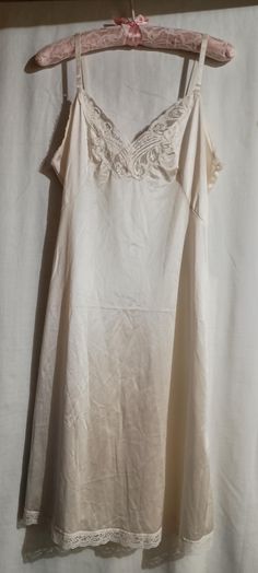 Women's Body Lites brand -vintage 1970's cream colored slip dress with floral lace front looks like a butterfly and lace at the bottom hem, adjustable Ribbon straps! SIZE - 36W/ Medium  * Free Shipping Summer Wedding Nightgown Bias Cut, Beige Slip Dress With Lace Trim For Daywear, Vintage Slip Dress For Wedding Night, Vintage Pajamas Aesthetic, Vintage Lace Slip Dress For Spring, Spring Cream Bias Cut Slip Dress, Spring Wedding Beige Slip Dress, Vintage Lace Trim Slip Dress, Vintage White Slip Dress With Lace Trim