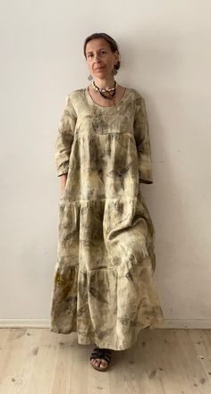 Wonderful one-piece linen dress with long sleeves and with side pockets. It is 100 % linen, eco printed with sumac leaves and dyed in walnuts leaves extract. The natural colors of green, khaki, navy and black blend perfectly with each other. I dye and sew all the items in my shop myself. Total length is 130 cm (51.18 in) . The dress can be made shorter. Flat measurements and size chart are listed on the photo. This dress will fit you perfectly if you wear a size M. You can wear it even if you are size S but like looser clothes. Measurements for size M: It is bust circumference up to 92 cm ( 36.22 in) Waist up to 74 cm (29.13 in) Hips up to 99 (38.98 in) The model for all my garments is me. Unfortunately, I am not tall, my height is 158 cm (62.2 in). I wear size S clothes. Thread count (met Eco Print Dress, Spring Bohemian Linen Dress With Pockets, Bohemian Linen Dress For Fall, Bohemian Beige Long Sleeve Linen Dress, Spring Linen Dress With Natural Dye, Casual Long Sleeve Dresses With Natural Dye, Ecoprint Dress, Eco Print, Eco Clothing