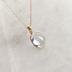 This stunning Pendant is set in 14k Solid Yellow Gold with Natural Clear Quartz with utmost precision. It is a unique gemstone Pendant for nearly every occasion and is completely hassle-free jewelry. ITEM DETAILS: * GEM: Clear Quartz * GEM SIZE: 12X16mm * GEM SHAPE: Oval * GEM WEIGHT: 10.60 carats * Gold Purity: 14KT * Gold Weight: 0.60 gram * Total Weight: 2.72 gram The Gold purity is guaranteed and it comes with authentic 14KT gold hallmark. Since my items are handmade, they are absolutely nickel and lead free. CUSTOMIZATION: * Gemstone customization is available and it can be substituted with a gem of your choice. Kindly message me for the same. PACKAGING * The Pendant comes with layers of safe and secure wrapping along with Free handmade jewelry box with every purchase. ➡️Head to these Luxury Oval Jewelry With Si Clarity, 14k Gold Briolette Gemstones For Gift, Timeless Teardrop Bezel Set Jewelry, Timeless Faceted Jewelry For Gift, Timeless Faceted Jewelry For Anniversary, Classic Rose Cut Diamonds Jewelry As Gift, Classic Rose Cut Diamonds Jewelry Gift, Faceted White Topaz Jewelry For Anniversary, 14k Gold Teardrop Jewelry With Bezel Setting