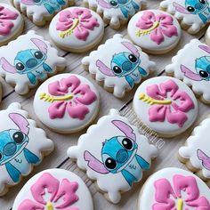 some decorated cookies are sitting on a table