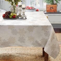 a white table cloth with snowflakes on it