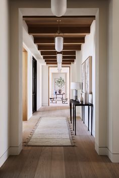 the hallway is clean and ready for us to use as an entrance way in this home