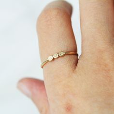 A 14k Gold Fill or Sterling Silver Tiny Dot Ring, perfect for stacking and now can be customized with a single letter initial! The perfect personalizable ring to include a custom alphabet initial that is special to you. The perfect stacking gold ring for a woman!  You can customize with either 1-3 discs with accompanying initials on each disc! Please note that we can do only capital initials, heart, and star on the disc only. No other characters are available.  ∙ Gift Ready in a jewelry box! ∙ H Tiny 14k Gold Stackable Rings For Anniversary, Alphabet Rings Gold, Custom Alphabet, Gold Earrings For Kids, Ring Initial, Gold Stacking Ring, Dot Ring, Dainty Gold Rings, Single Letter