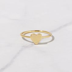 Beautiful, and dainty heart ring. - - - D E T A I L S - - - * Made of 925 Sterling Silver * Available in 14k Gold or Rhodium Plated * We use a THICK plating of 14k Gold for a piece that is sure to last years to come * Nickel-free & Hypoallergenic * WILL NOT TURN FINGER GREEN! * Available in Sizes 4, 5, 6, 7, 8, 9, or 10 * Ring Measurements: Heart: 7mm WIDTH: 1.3mm Ring Sizer- https://www.etsy.com/listing/1240904225/ring-sizer-reusable-ring-sizer-plastic?click_key=b5e074cfb419bcfddc2d9f2ce4b2f537 Minimalist Stackable Rings With Heart Charm For Promise, Dainty Stackable Midi Rings For Valentine's Day, Minimalist Heart Shaped Stackable Promise Rings, Dainty Stackable Heart Ring Gift, Gold Heart-shaped Stackable Midi Rings, Dainty Heart Charm Stackable Gift Rings, Minimalist Stackable Rings With Heart Charm For Anniversary, Dainty Stackable Gift Rings With Heart Charm, Gold Stackable Heart Midi Rings