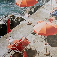 “Shot on film while driving along the Amalfi coast in Italy. During our roadtrip, we discovered a relaxing beach bar near the pretty village of Positano, we had to go there and as we walked down the narrow staircase, I shot this view of characteristic orange umbrellas and sunbeds. I still remember the crystal-clear water and the breeze of summer.” - Tim Buiting Narrow Staircase, Orange Umbrella, Living Photo, Beach Bars, Studio Decor, Crystal Clear Water, Home Photo, Positano