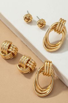 Elevate your earring game with our Premium Trio Metal Knot and Hoop Earrings - a set of three stunning pieces designed to make a statement. Crafted from iron, these earrings feature large metal knots with a very shiny and smooth finish. The shiny gold plating adds a touch of luxury, making them perfect for both casual and formal occasions.Size: 0.3-0.75-1.5" Style: Chic Embellishment: Knot Closure: Push Back Hoop Earring Sets, Knot Earrings, Style Chic, Bottom Clothes, Silver Hoop Earrings, Gold Plating, Post Earrings, Fashion Earrings, Crafts To Make