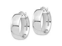 Rhodium over 14k white gold high polished hoop earrings. Measure approximately 13/16"L x 1/4"W and have saddleback backings. Modern Oval Huggie Earrings For Anniversary, Fine Jewelry Oval Hoop Earrings With Polished Finish, Oval Polished Hoop Earrings Fine Jewelry, Oval Hoop Earrings With Polished Finish, Modern Sterling Silver Huggie Earrings For Formal Events, Modern Sterling Silver Huggie Earrings For Formal Occasions, Formal Hypoallergenic Oval Hoop Earrings, Classic Sterling Silver Earrings With Polished Finish, Classic Oval Huggie Earrings With Polished Finish