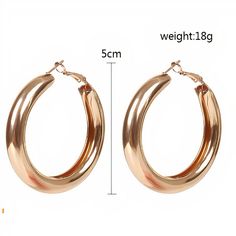 Stay on trend with these gold and silver plated thick hoops. - Care Instructions: Avoid contact with water, lotion, and perfume. Clean gently with a polishing cloth. Product Specifications: - Elegant and versatile design - Hypoallergenic for sensitive ears - Adds a touch of glamour to any outfit Trendy Rose Gold Metal Hoop Earrings, Trendy Metal Jewelry With Shiny Finish, Trendy Rose Gold Tarnish-resistant Hoop Earrings, Trendy Small Hoop Earrings In Rose Gold, Trendy Small Hoop Rose Gold Earrings, Chic Rose Gold Metal Hoop Earrings, Classic Metal Hoop Earrings For Party, Trendy Rose Gold Hoop Earrings, Perfume Clean