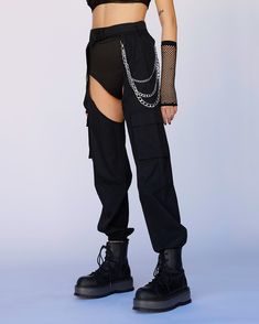 Our Darkest Hours Chain Chaps gotcha miles ahead of the rest, babe. Stunt on 'em in these badass black chap pants that feature an adjustable speed clasp closure, two side pockets, and removable chain details. Booty shorts not included Detachable chain clasps 100% Polyester Dry clean only Manga Reference, Body Chain Harness, Couples Accessories, Glitter Glasses, Festival Gear, Face Gems, Fairy Dresses, Glitter Hair, Glasses Accessories