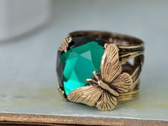 BUTTERFLY IN MOTION Neo Victorian vintage style by junesnight, $42.50 Vintage Handmade Butterfly Ring Gift, Handmade Vintage Butterfly Ring Gift, Handmade Vintage Butterfly Ring For Gift, Vintage Rings With Jewels As A Gift, Vintage Gold Butterfly Ring Gift, Vintage Butterfly Jewelry For Wedding, Elegant Green Butterfly Ring As Gift, Emerald Green Butterfly, Butterfly Cottage