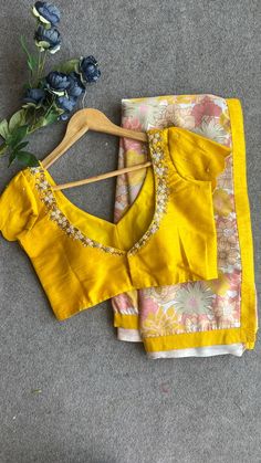 Product Descriptions : Yellow silk patterned & intricate pearl detailed hand worked blouse having highlighted pearl hand works for neck both front & back as shown Note : saree is not included with this product View this post on Instagram A post shared by Handcrafted Sarees by Shobana Nithin (@threadslabel_india) View this post on Instagram A post shared by Handcrafted Sarees by Shobana Nithin (@threadslabel_india) Printed Blouse Designs For Saree, Yellow Blouse Designs, Girls Saree, Hand Worked Blouse, Blouse Handwork, Simple Blouses, Ready Made Blouse, Worked Blouse, Handwork Blouse