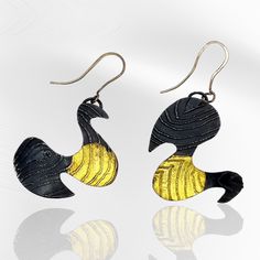 Gold & Steel Earrings - These eye-catching steel earrings feature a pop of 24k gold applied using the ancient Korean technique of Keum-Boo. The etched earrings are patinated a deep black, highlighting the glow of the gold. Extremely light weight. Artistic Black Jewelry With Matching Earrings, Artistic Black Drop Earrings, Hand Forged Black Earrings For A Gift, Hand Forged Black Earrings As A Gift, Black Hand Forged Brass Earrings, Hand Forged Black Brass Earrings, Contemporary Earrings With Oxidized Finish, Contemporary Earrings With Oxidized Finish As Gift, Contemporary Oxidized Finish Earrings For Gift