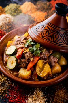 Moroccan lamb tagine with vegetables and herbs in a traditional clay pot. Traditional African Food, Morocco Recipes, Africa Dishes, Moroccan Tajine, Moroccan Tagine, Moussaka Recipe