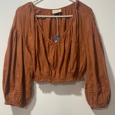 Description Universal Thread. Long Sleeve Crop Top Blouse Brown Rust Xl. 100% Cotton V Neck Waist Elastic Ruffle Shirts Blouses, Sleeveless Tops Summer, Flowy Shirt, White Long Sleeve Shirt, Tie Front Blouse, Ruffle Shirt, Puff Sleeve Blouse, Floral Print Blouses, Long Puff Sleeves