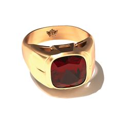 Part of the Resort Collection, the Grand Touring Ring is a statement of refined adventure and sophistication. Cast in solid gold and crowned with a deep red garnet, this signet ring captures the essence of timeless luxury. The rich hue of the garnet evokes the allure of far-flung destinations and the warmth of sunset-lit landscapes. Designed for the discerning traveler who seeks both elegance and character, this ring pairs classic signet styling with a modern flair. The Grand Touring Ring is mor Yellow Gold Garnet Signet Ring With Gemstone, Yellow Gold Garnet Ring With Polished Finish, Heirloom Red Signet Ring With Polished Finish, Classic Red Signet Ring For Formal Occasions, Yellow Gold Ruby Signet Ring With Polished Finish, Timeless Red Ring With Polished Finish, Gold Ruby Signet Ring With Polished Finish, Formal Red Ruby Ring With Polished Finish, Formal Polished Red Ruby Ring