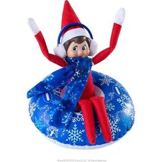 the elf is sitting on top of an inflatable ball