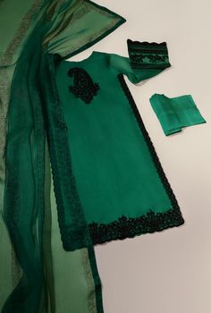 Curated on pure emerald green organza with hand kashmiri embroidery on front back and sleeves alongside hand blocked borders with pretty laces, matching pure raw silk trousers with hand blocked pure organza dupatta, “ Arnisha “ will be your new favourite look to go to. Order Duration: 4 to 6 weeks Festive Green Salwar Kameez With Dabka Embroidery, Cotton Silk Lawn Suit With Dabka Work For Party, Festive Green Salwar Kameez With Dabka, Party Lawn Suit With Chikankari Embroidery In Raw Silk, Festive Green Dabka Salwar Kameez, Designer Traditional Green Wear With Dabka, Green Dabka Salwar Kameez With Straight Kurta, Bollywood Style Party Lawn Suit In Cotton Silk, Bollywood Style Cotton Silk Lawn Suit For Party