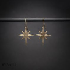 "You'll shine when you will wear this celestial dangle earrings. This north stars earrings is perfect to wear at work, holidays, and even for a party. ★Comes in our signature gift box, ready for gift giving. ★ Available in Gold [ gold-filled ear wires & gold plated brass ] ★ Earring size (star) 1.20\"x0.90\". Thanks for shopping at ByYaeli♥ All images, texts & products are property of ByYaeli ©2020" Star Dangle Earrings, Stars Earrings, Jewelry Design Studio, Gold Skull, Goth Jewelry, Fan Earrings, Celestial Jewelry, Star Jewelry, Gold Filled Earrings