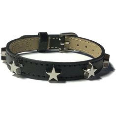 "Love stars?   You'll love this bracelet!  It has Chrome color star studs evenly spaced across the center of a genuine black leather buckle bracelet wristband strap. This black leather buckle wristband bracelet strap is 10mm wide and about 8 inches long.   It can fit a wrist from 5.5\"  to 7.5\" around.  The strap is made of Genuine leather material and are stamped as such on the back. They are sewn around the edges for more durability. The band is adjustable and has a nickel tone buckle closure Edgy Adjustable Star-shaped Jewelry, Adjustable Edgy Star Jewelry, Adjustable Edgy Star-shaped Jewelry, Black Trendy Bracelets With Studs, Adjustable Star-shaped Edgy Jewelry, Trendy Black Bracelets With Studs, Trendy Silver Leather Bracelet With Studs, Adjustable Black Bracelet With Star Charm, Studded Bracelet