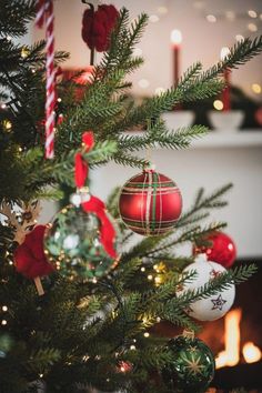 a christmas tree with ornaments hanging from it