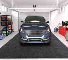 a blue car is parked in a garage