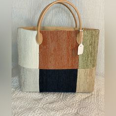 Brand New. This Tote Is Smaller, The Inside Is 100% Cotton With A Fabric Exterior. This Is A Color Block Style. Dimensions: Each Piece Is One Of A Kind. Summer Leather Square Shoulder Bag, Multicolor Leather Bags For Summer, Summer Square Leather Bag, Multicolor Rectangular Modern Bucket Bag, Modern Multicolor Rectangular Bucket Bag, Textile Bags, Handmade Fabric Bags, Textile Bag, Bags Handmade