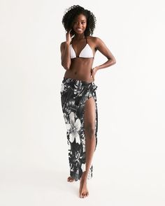 Our Guam Women's Swim Cover Up is a must-have, whether you're heading to the beach or pool. With a lightweight and flowy feel, this accessory can be styled in multiple ways to complete your swimwear look. Lightweight, sheer, flowy fabric Self-tie closure Printed, cut, and handmade Size & Fit One size fits all Style multiple ways Length: 55"x 54" Model is 5'9, one size Material & Care Machine wash cold, tumble dry low 100 % Polyester Fabric weight: 5.60 oz/yd² (190g/m²) Imported Shipping Every sarong is handmade just for you 5-7 business days before it's shipped out. $3.99 Standard Shipping: 7-10 business days for continental US, longer for rest of the world. Summer Beach Sarong For Resort Season, Summer Sarong For Beach And Resort Season, Black Beachwear Swimwear For Vacation, Casual Sarong For Beach Season Vacation, Adjustable Swimwear For Beach In Spring, Black Beachwear For Vacation, Adjustable Beachy Swimwear For Beach Season, Casual Sarong For Beach Season Poolside, Casual Sarong For Poolside And Beach Season