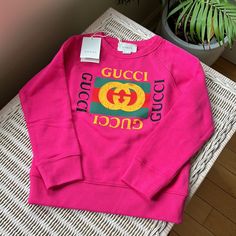 Authentic Unisex Gucci Logo Toddler Pullover Sweatshirt. Made In Italy . New With Tags. Trendy Long-sleeve Tops With Logo Detail, Trendy Long Sleeve Tops With Logo Detail, Pink Winter Sweatshirt With Logo Detail, Casual Pink Sweatshirt With Logo, Pink Cotton Top With Logo Detail, Gucci Cotton Sweatshirt With Ribbed Cuffs, Designer Long Sleeve Sweatshirt With Logo, Gucci Cotton Sweatshirt With Logo, Gucci Long Sleeve Tops With Embroidered Logo