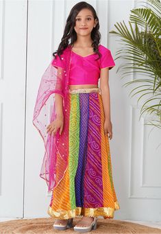 Readymade Faux Georgette Lehenga in Multicolor This attire with Shantoon Lining is Enhanced with Fancy Tassels, Bandhej, Leheriya Print, Mirror, Zari Work In Belt, Gota Lace in Lehenga Drawstrings with Beautiful Dupatta Enhanced with Sequinned Buties and Gota Lace Available with a Art Silk Pink Choli Crafted in V Neck and Short Sleeves and a Net Dupatta in Pink Do Note: Accessories shown in the image are for presentation purposes only. (Slight variation in actual color vs. image is possible). Multicolor Sets With Sheer Dupatta, Multicolor Palazzo Set With Sheer Dupatta For Navratri, Multicolor Palazzo Set With Sheer Dupatta For Summer, Traditional Drape Multicolor Palazzo Set For Navratri, Multicolor Palazzo Set With Unstitched Blouse And Traditional Drape, Multicolor Palazzo Set With Sheer Dupatta For Diwali, Diwali Multicolor Palazzo Set With Sheer Dupatta, Multicolor Choli With Sheer Dupatta In Traditional Drape, Multicolor Choli With Sheer Dupatta And Traditional Drape